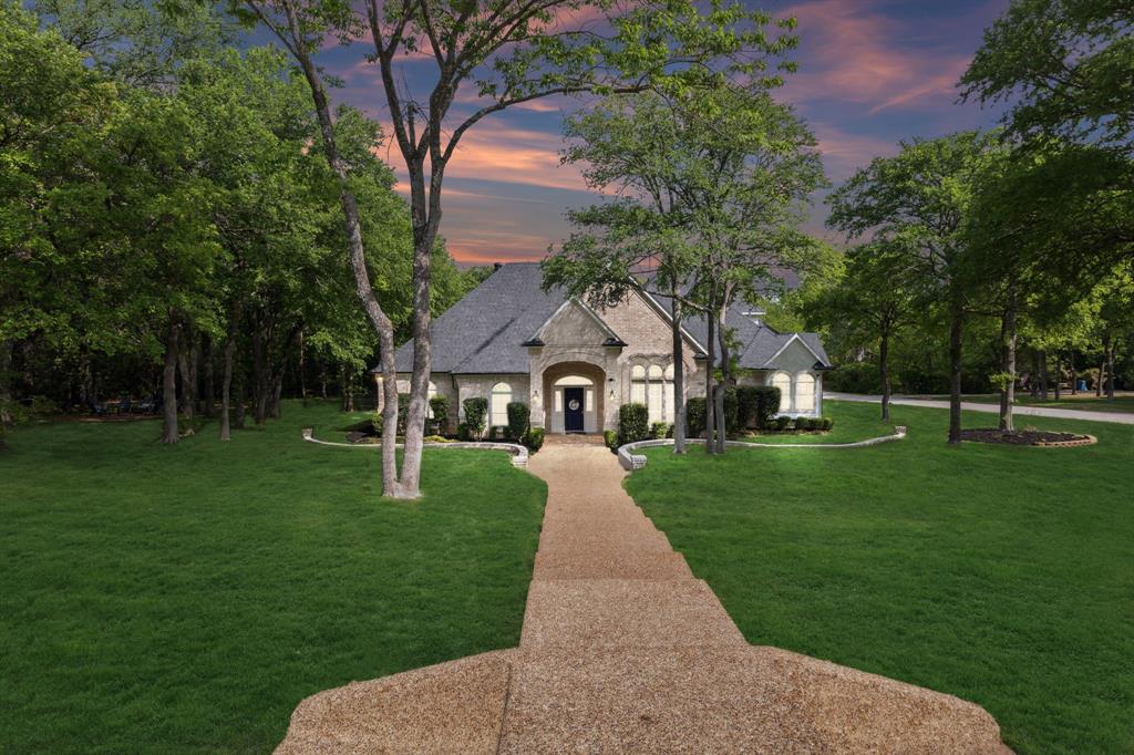 5316 Park Ridge Road Flower Mound, TX 75022 - Photo 1 of 1 a front view of a house with garden