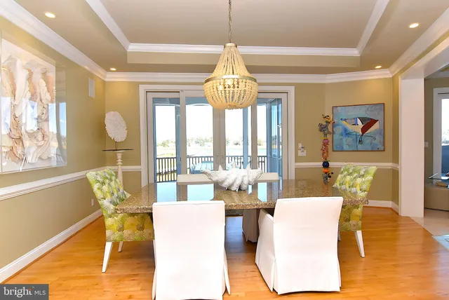 a spacious bathroom with a granite countertop sink and a large mirror