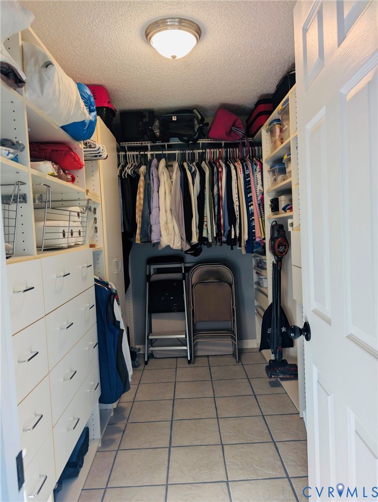 2701 Executive Drive Chester, VA 23831 - Photo 16 of 27 Spacious master closet with custom built-ins.