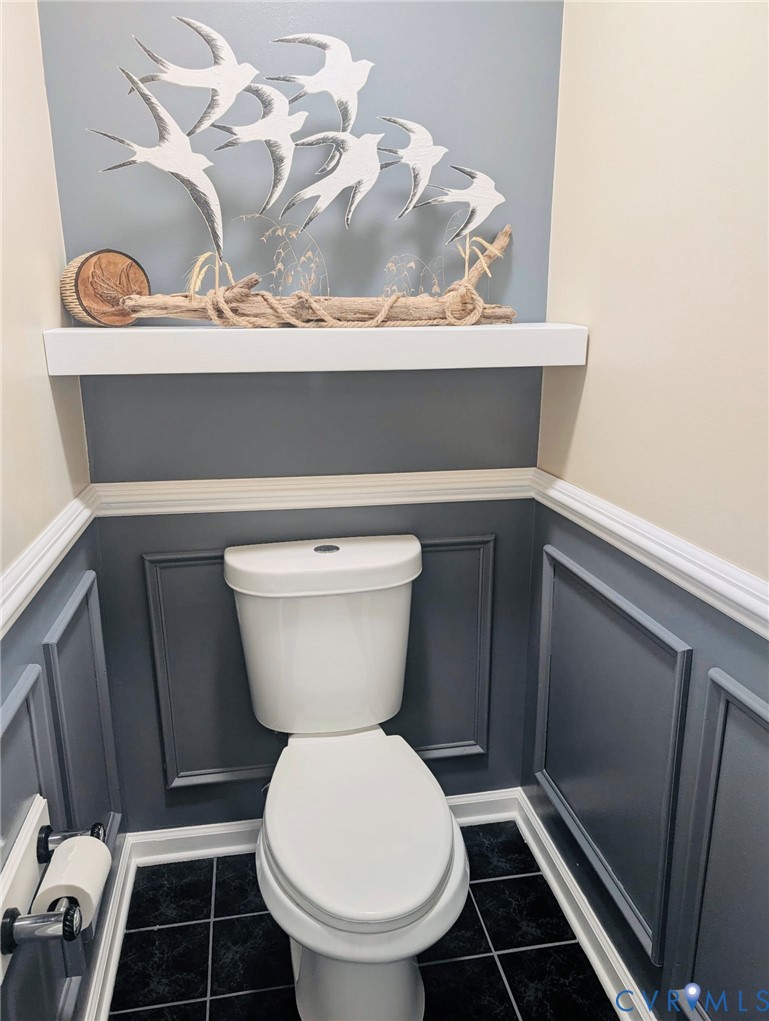 2701 Executive Drive Chester, VA 23831 - Photo 19 of 27 Bathroom with a decorative wall, wainscoting, and