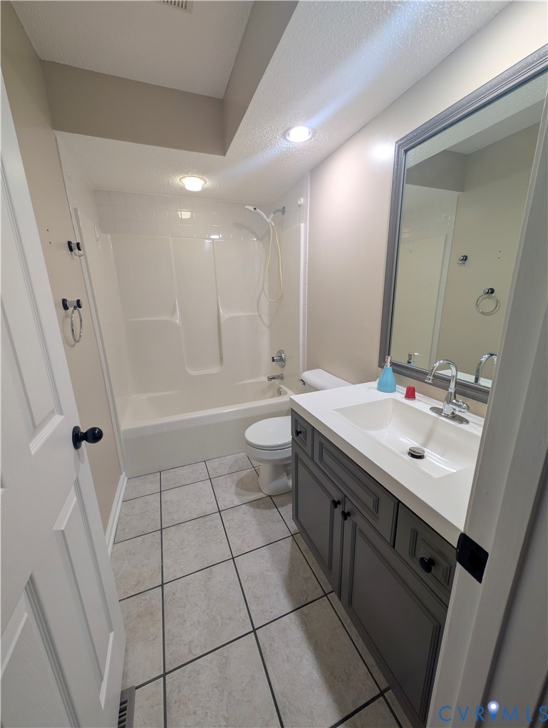 2701 Executive Drive Chester, VA 23831 - Photo 22 of 27 Hallway Bathroom featuring vanity, shower / washtu