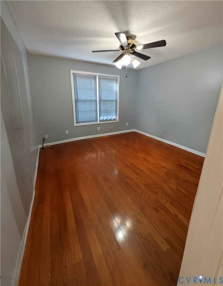 2701 Executive Drive Chester, VA 23831 - Photo 23 of 27 2nd bedroom with wood-type flooring and loads of b