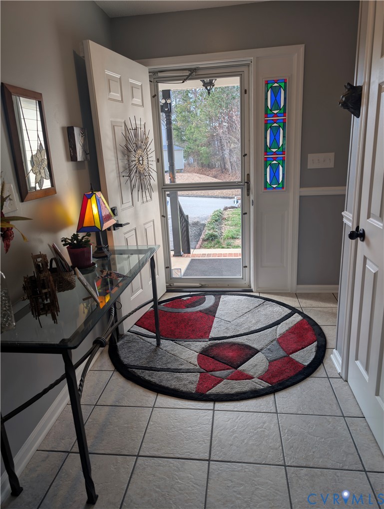 2701 Executive Drive Chester, VA 23831 - Photo 5 of 27 Foyer with light tile patterned flooring, heavy st