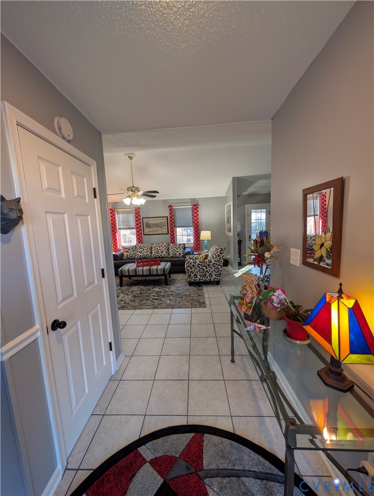 2701 Executive Drive Chester, VA 23831 - Photo 6 of 27 Corridor Foyer featuring light Italian tile patter