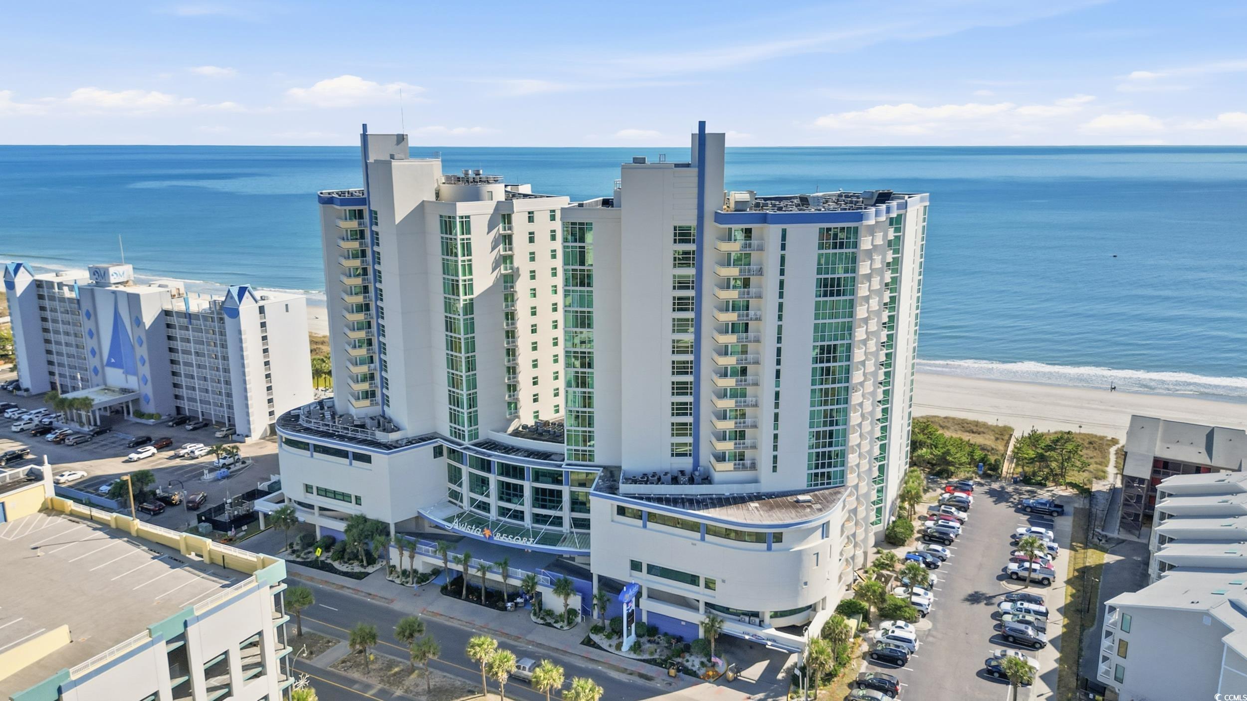 300 North Ocean Boulevard, Unit 1608 North Myrtle Beach, SC 29582 - Photo 4 of 30 Drone / aerial view of apartment complex / building and waterfront with a beach