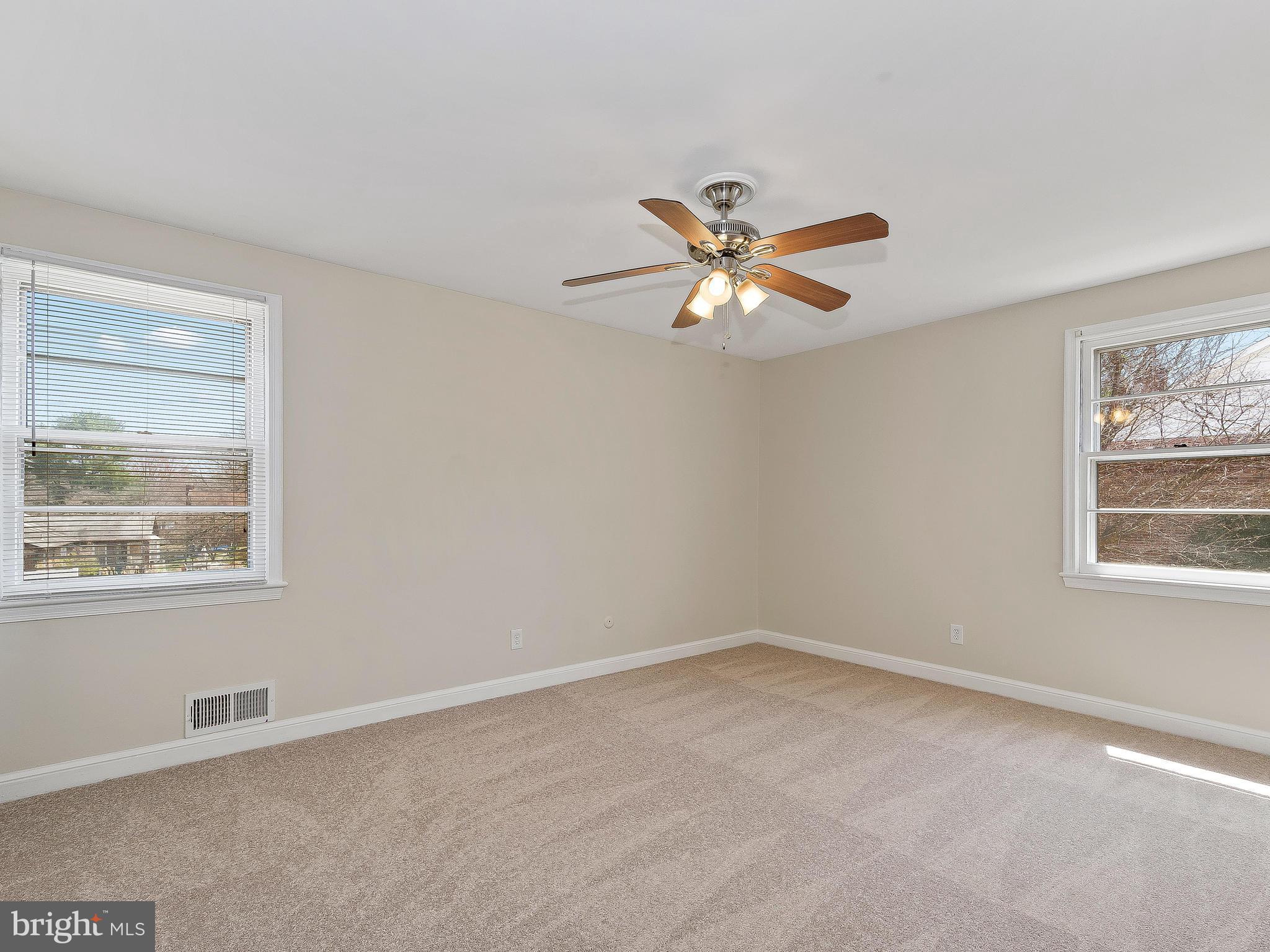 13245 Glenhill Road Silver Spring, MD 20904 - Photo 16 of 30 an empty room with a window