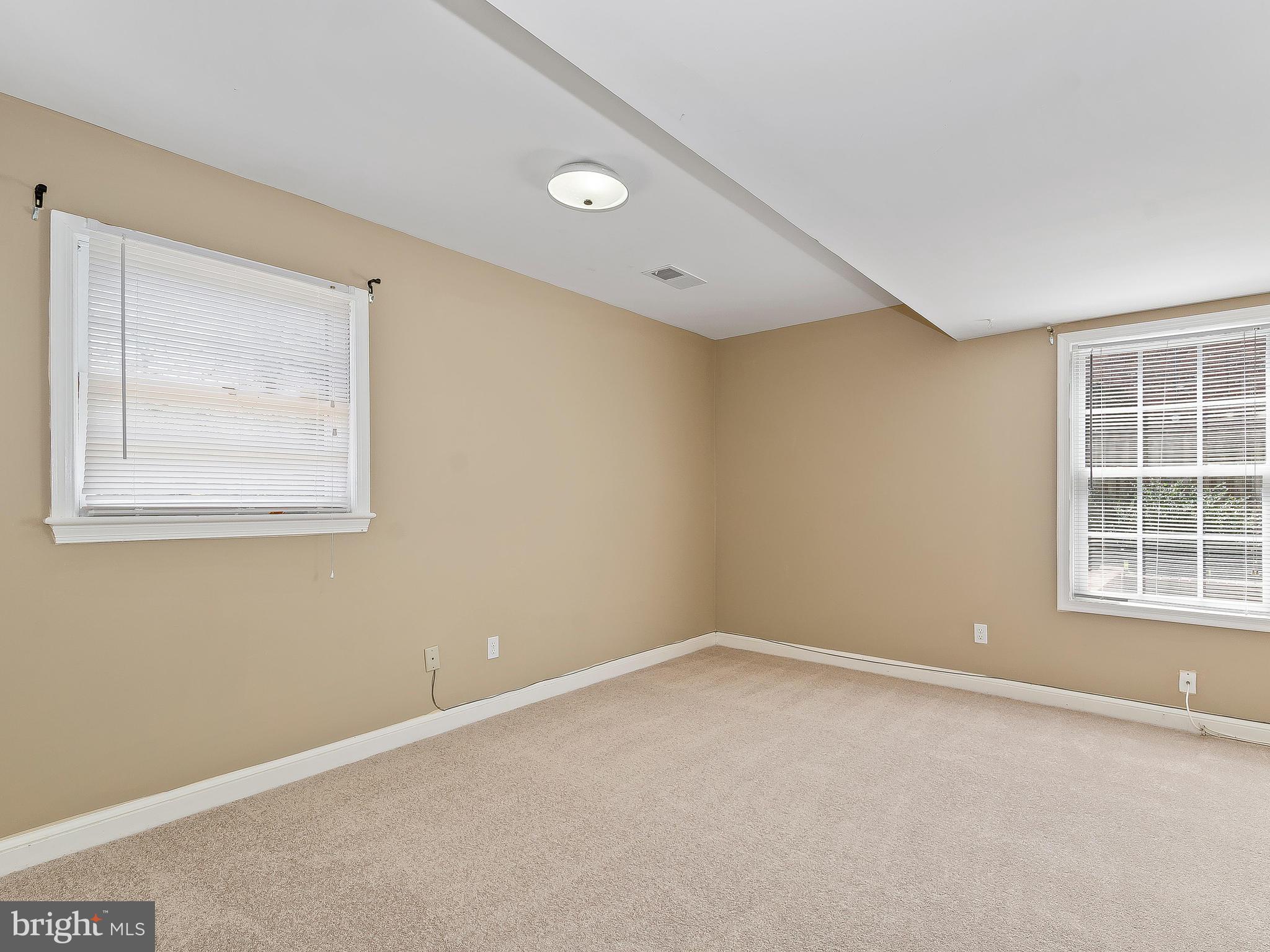 13245 Glenhill Road Silver Spring, MD 20904 - Photo 21 of 30 an empty room with a window