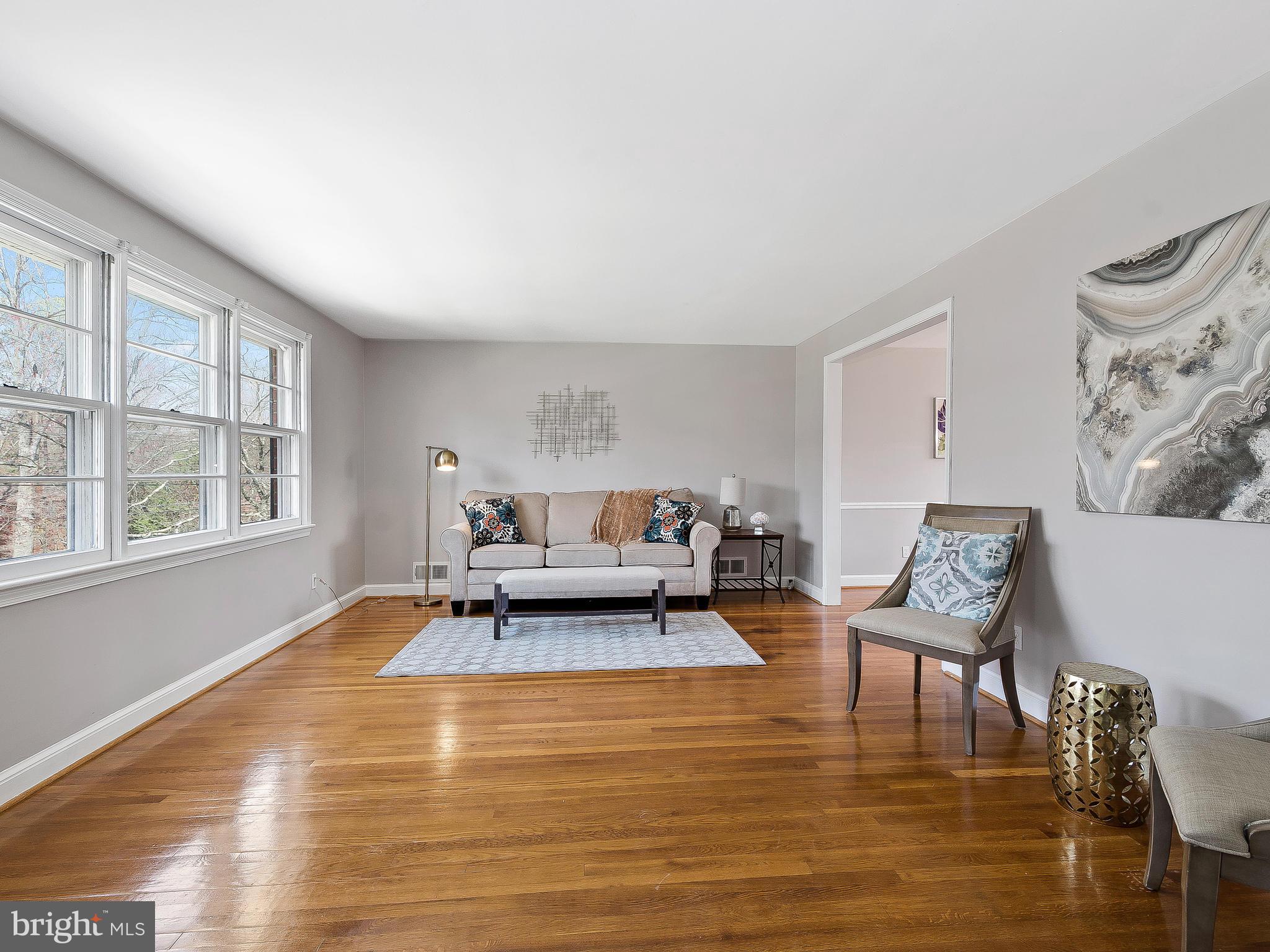 13245 Glenhill Road Silver Spring, MD 20904 - Photo 5 of 30 a living room with furniture and a large window