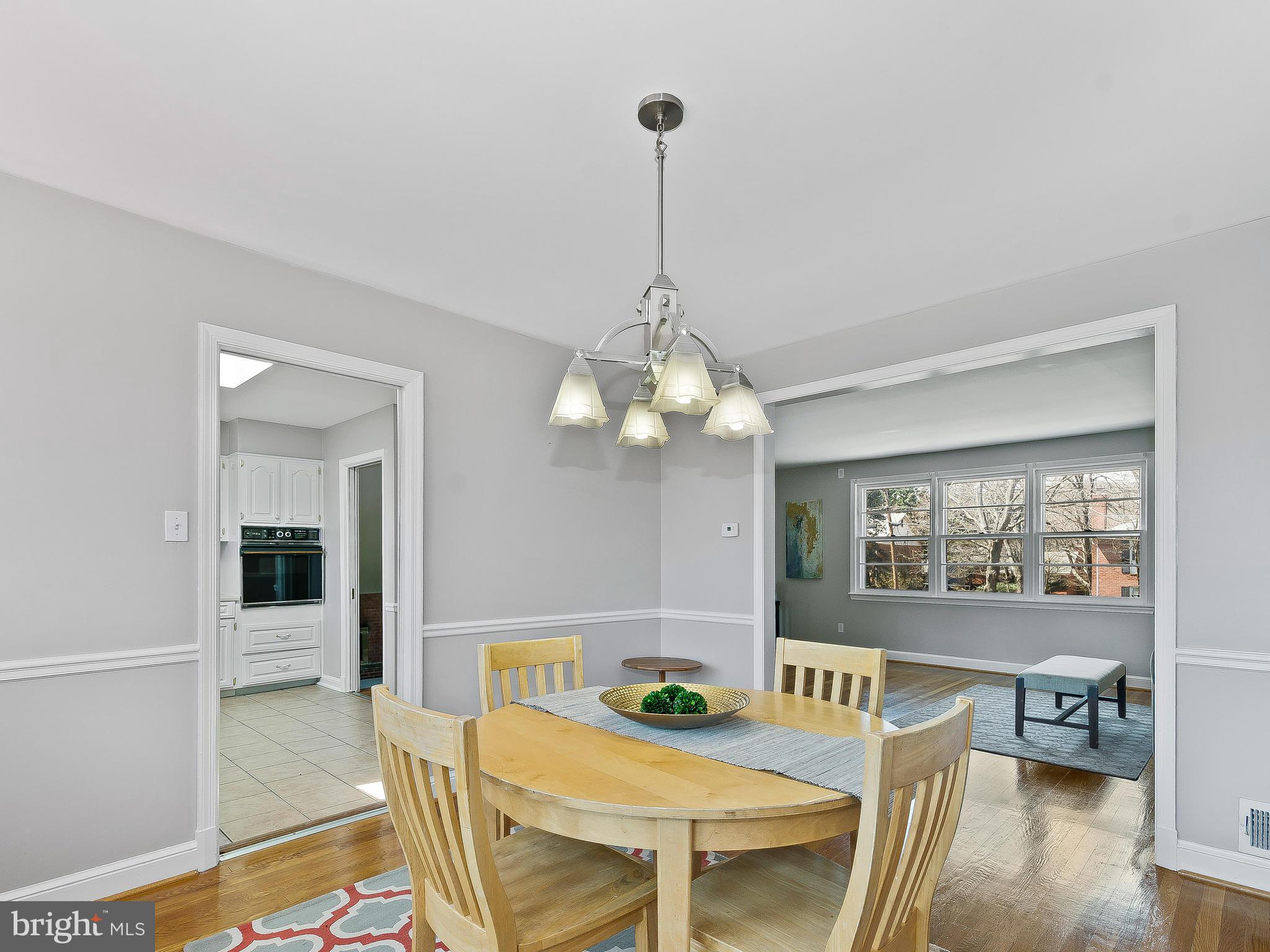 13245 Glenhill Road Silver Spring, MD 20904 - Photo 8 of 30 a view of a dining room with furniture and wooden floor