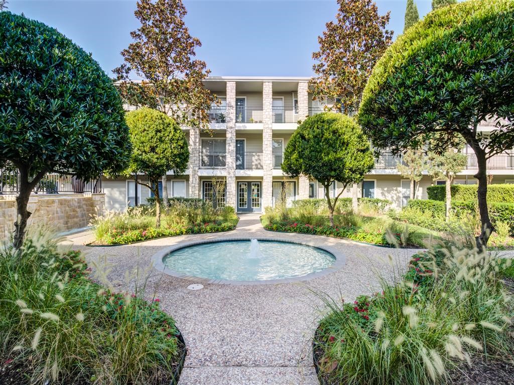 7315 Brompton Street, Unit 342B Houston, TX 77025 - Photo 16 of 17 front view of a house with a garden