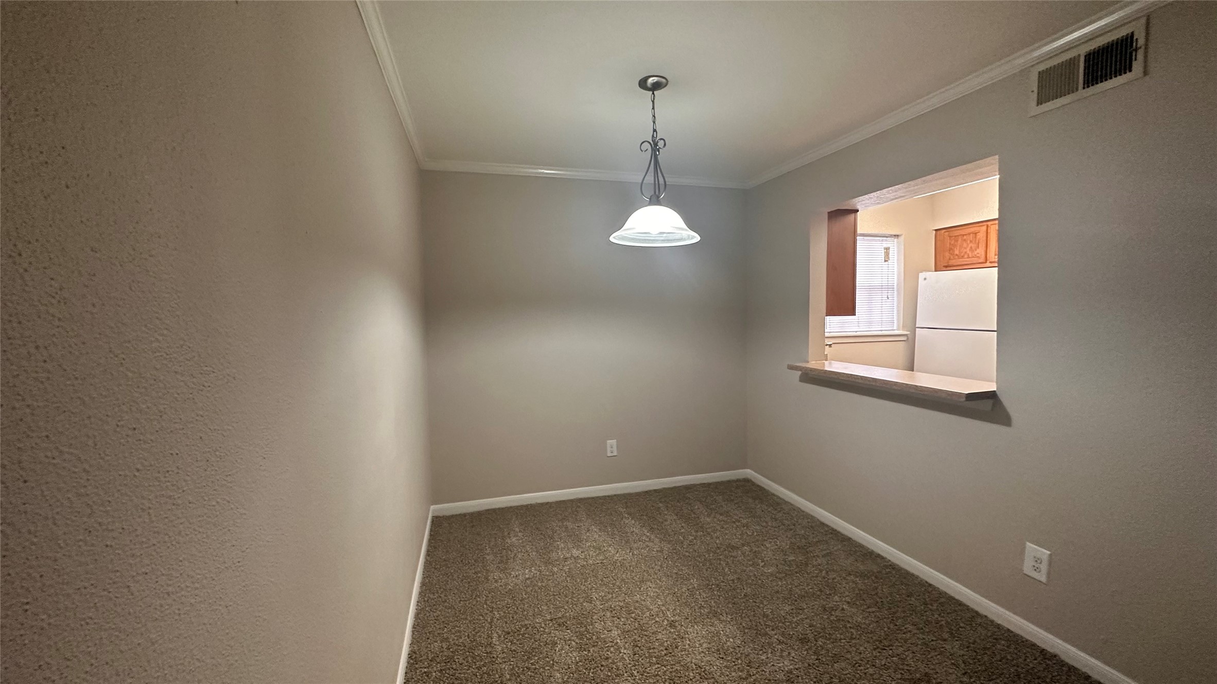 7315 Brompton Street, Unit 342B Houston, TX 77025 - Photo 4 of 17 an empty room with a window