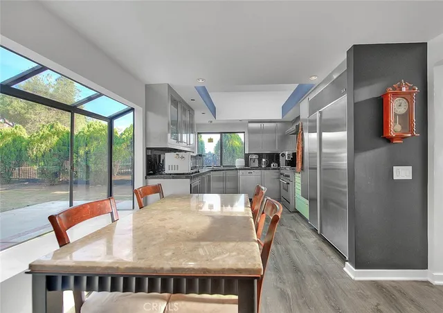 a view of livingroom with furniture wooden floor and window