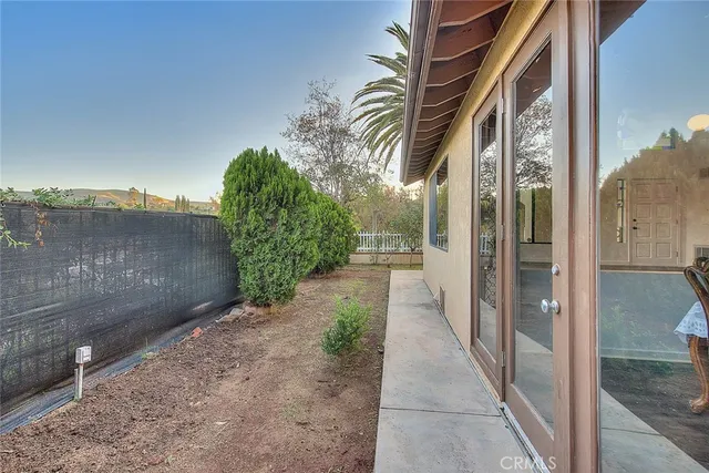 a view of a livingroom with shelves