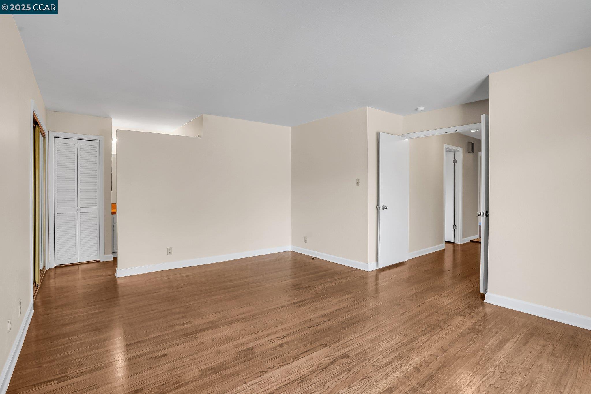 348 Barrett Circle Danville, CA 94526 - Photo 25 of 41 a view of an empty room with wooden floor