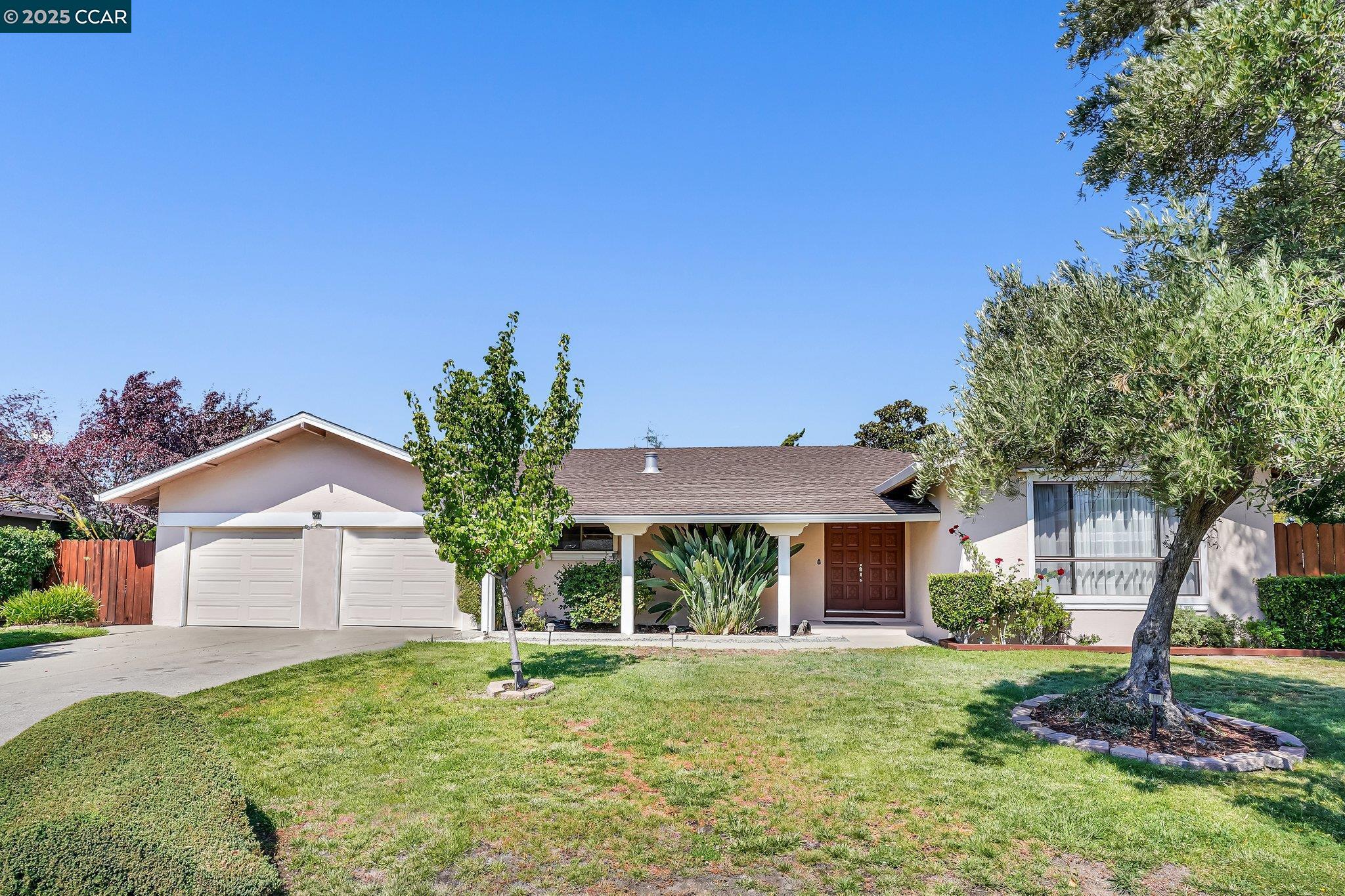348 Barrett Circle Danville, CA 94526 - Photo 3 of 41 a front view of a house with garden
