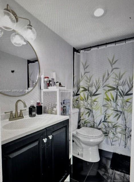 4174 Inverrary Drive, Unit 914 Lauderhill, FL 33319 - Photo 8 of 13 a bathroom with a sink and a mirror