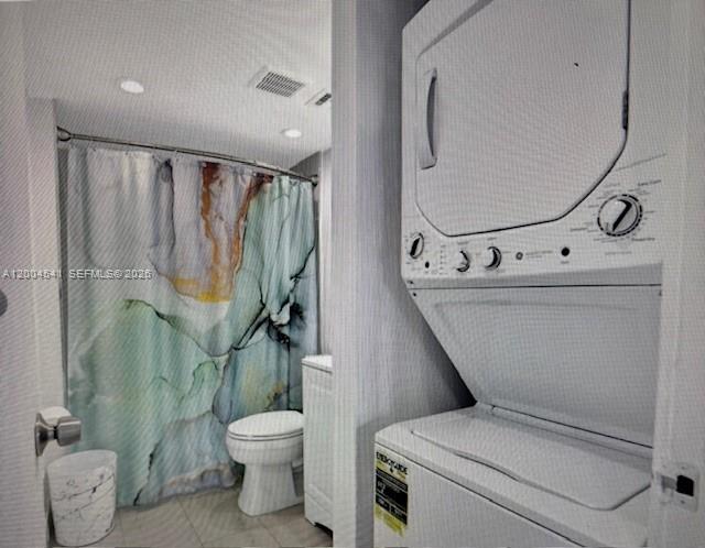 4174 Inverrary Drive, Unit 914 Lauderhill, FL 33319 - Photo 9 of 13 a bathroom with a toilet sink and mirror
