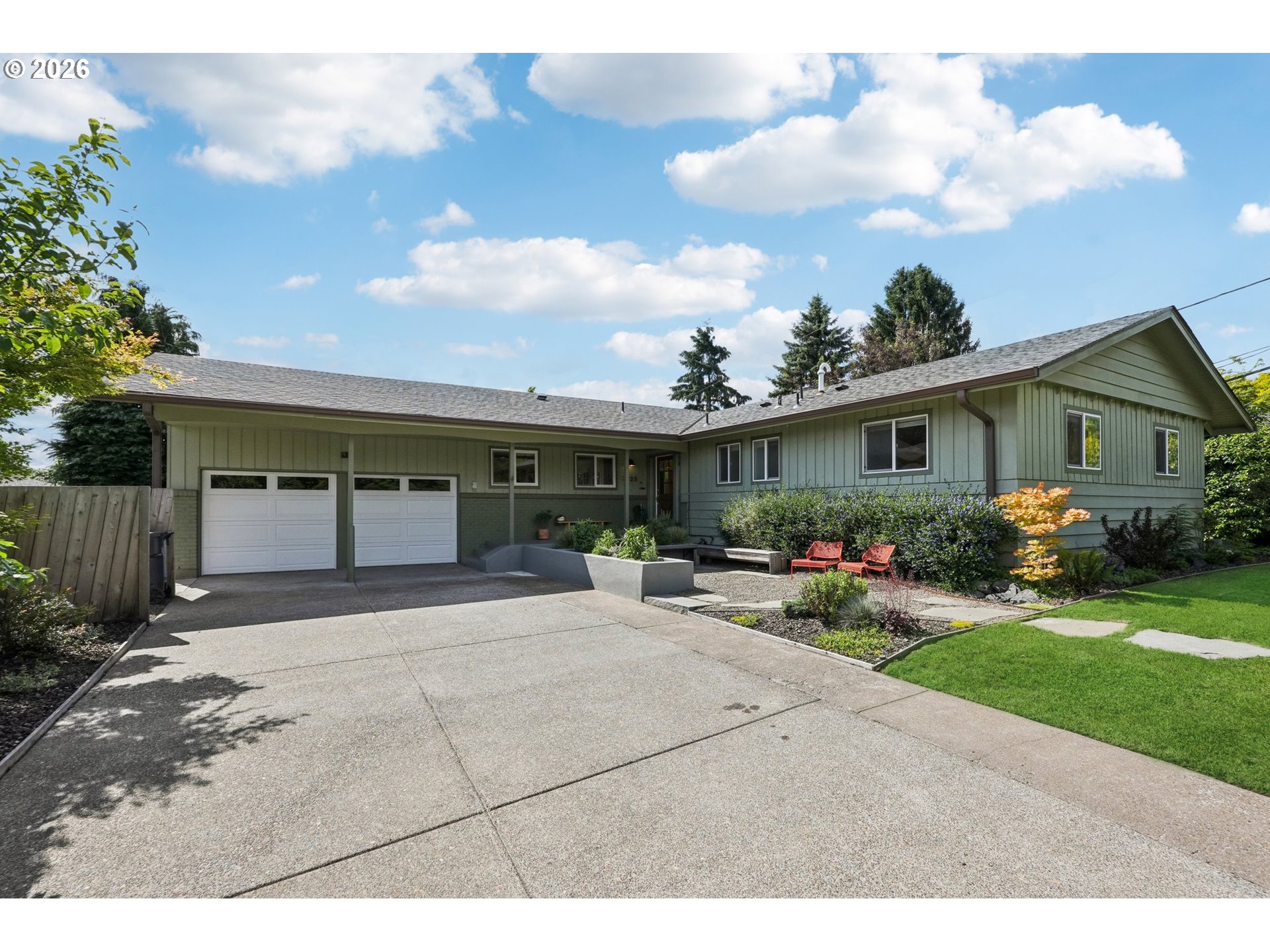 7225 Southwest 13th Avenue Portland, OR 97219 - Photo 1 of 48 a view of house with yard and garage