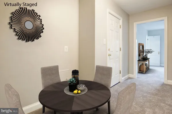 a view of kitchen and dining area with furniture