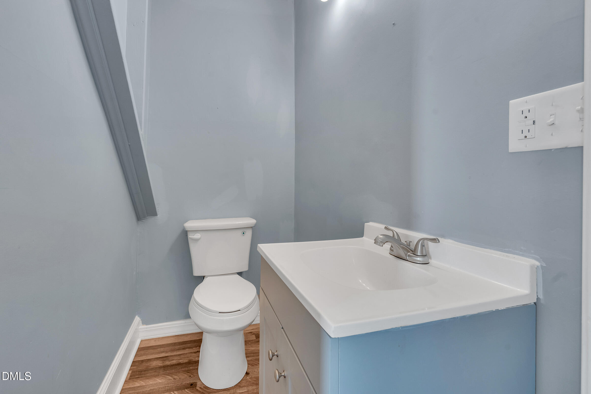 134 Nelson Street Durham, NC 27707 - Photo 11 of 25 a white toilet sitting next to a white sink