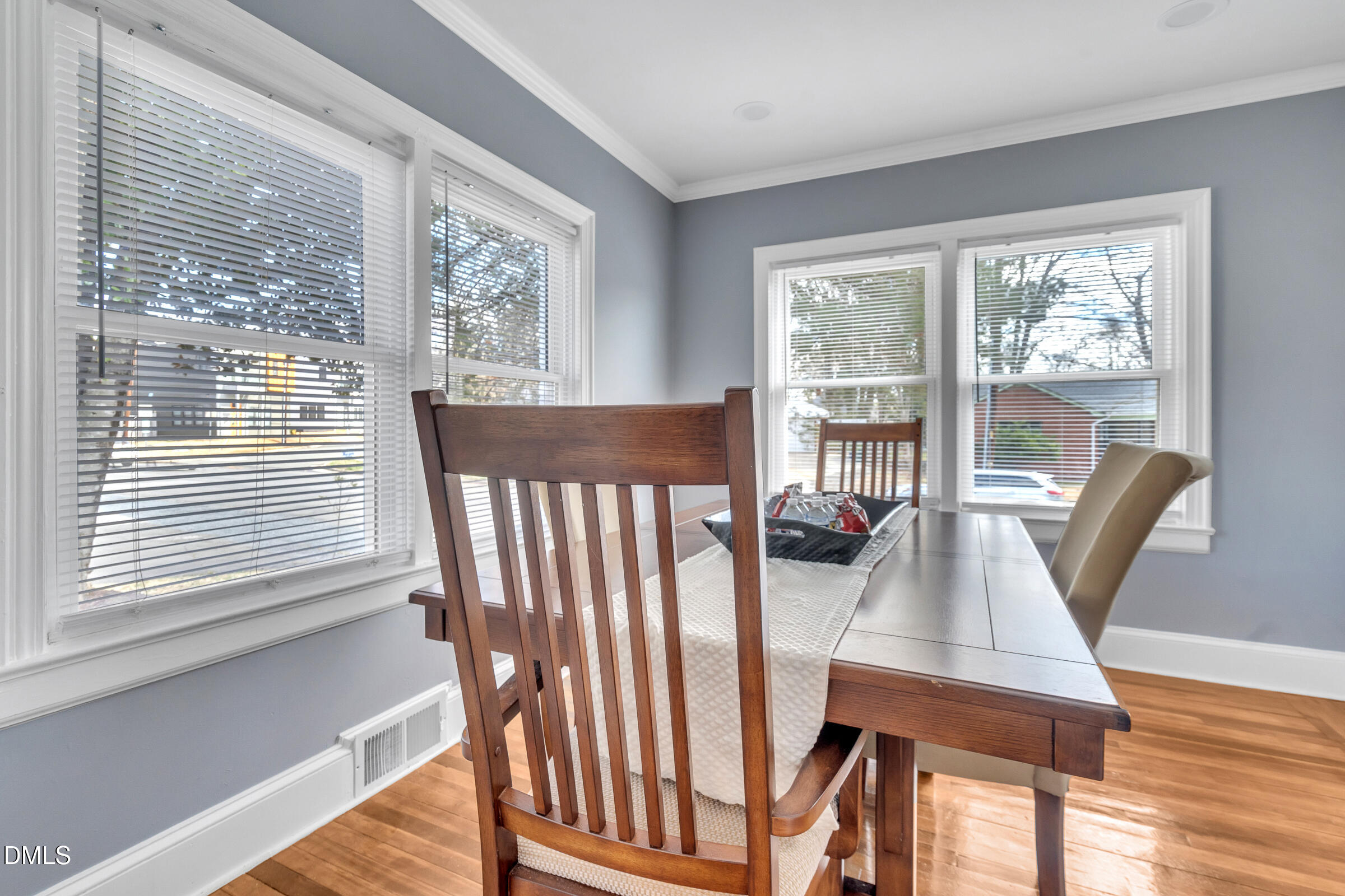 134 Nelson Street Durham, NC 27707 - Photo 15 of 25 a view of a dining room with furniture window and wooden floor