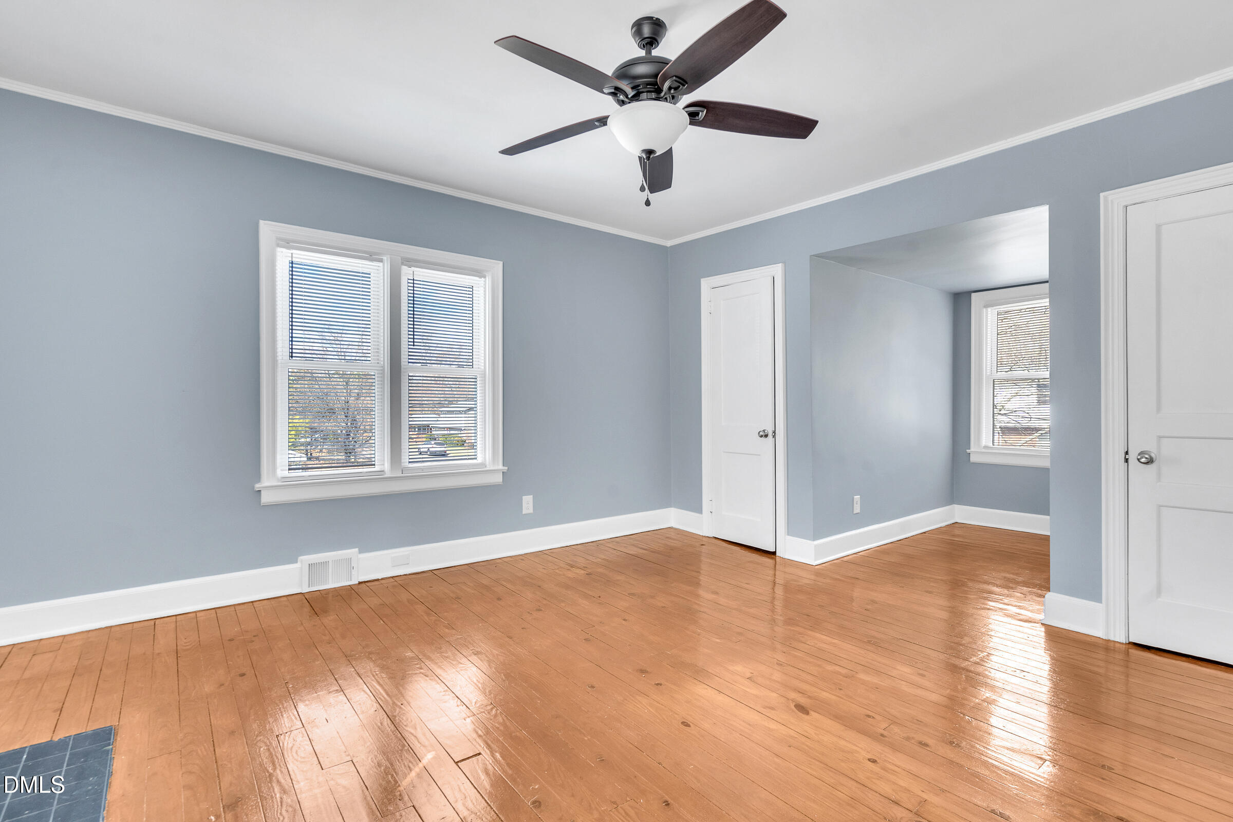 134 Nelson Street Durham, NC 27707 - Photo 16 of 25 a view of an empty room with window and a kitchen