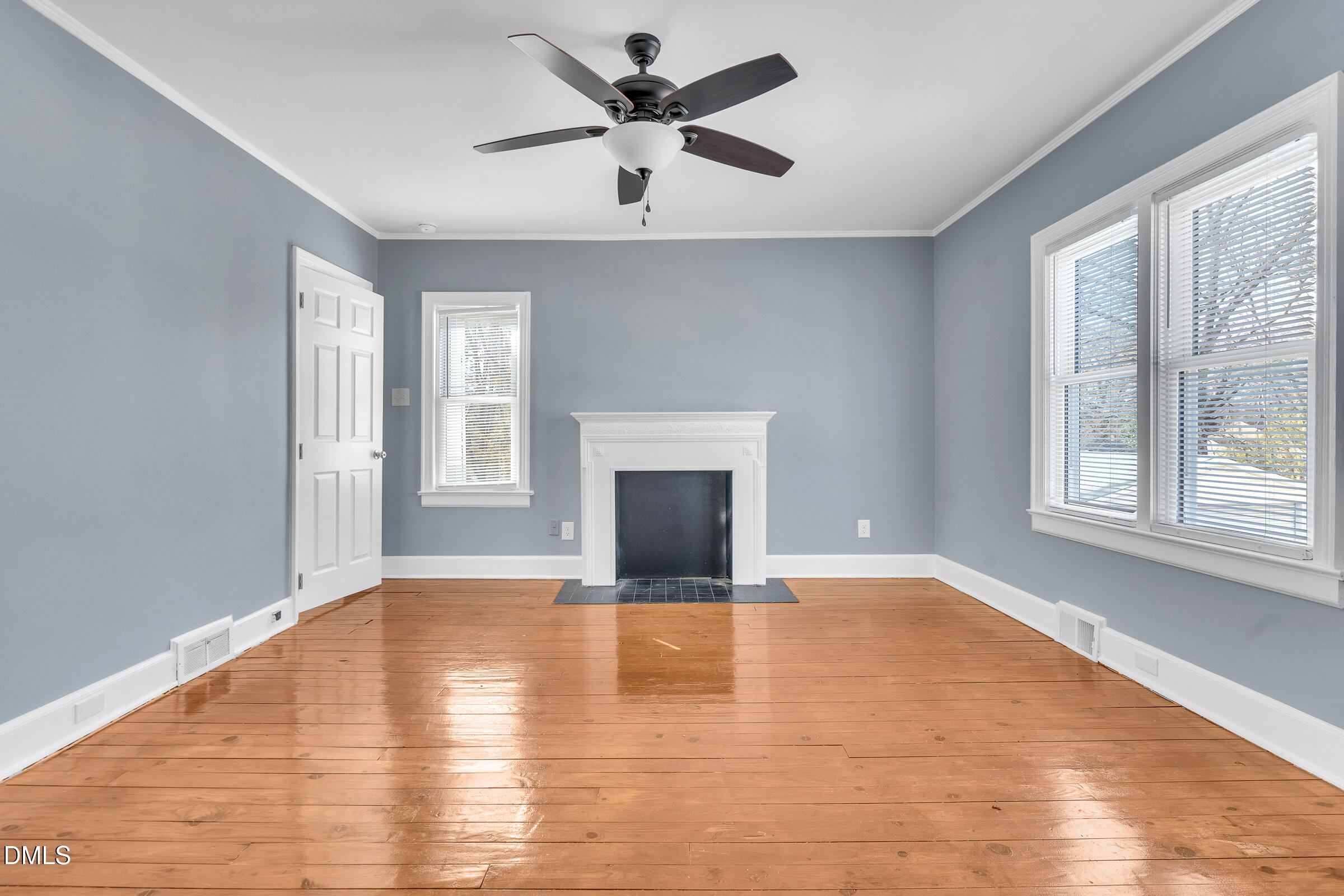 134 Nelson Street Durham, NC 27707 - Photo 17 of 25 a view of an empty room with window and kitchen view