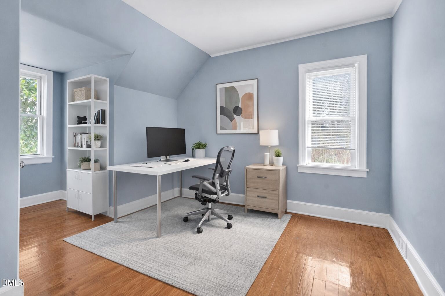 134 Nelson Street Durham, NC 27707 - Photo 21 of 25 a view of a workspace with furniture and a window