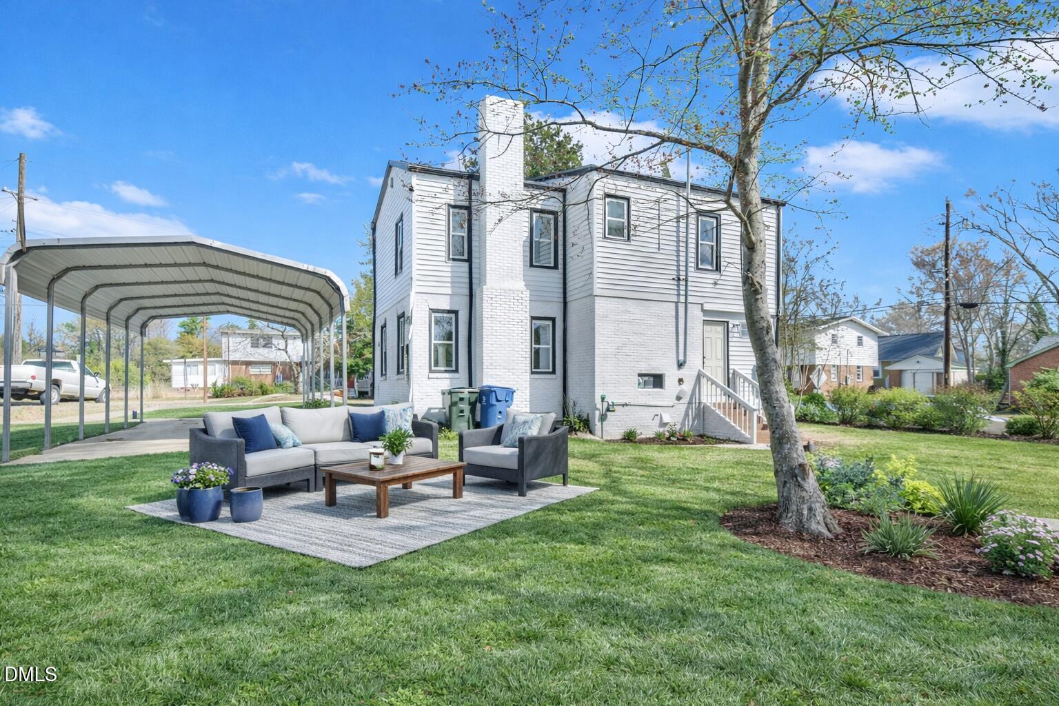 134 Nelson Street Durham, NC 27707 - Photo 6 of 25 a building outdoor space with patio lots of furniture and garden