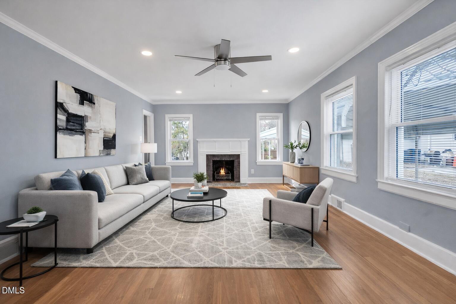 134 Nelson Street Durham, NC 27707 - Photo 9 of 25 a living room with furniture and a fireplace