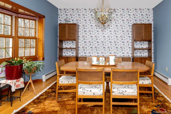 a outdoor space with a table and chairs