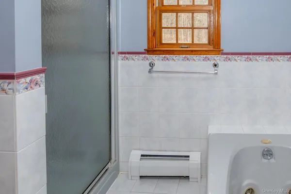 a view of yard with large tree