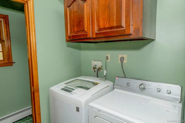 a view of yard covered with snow in the background