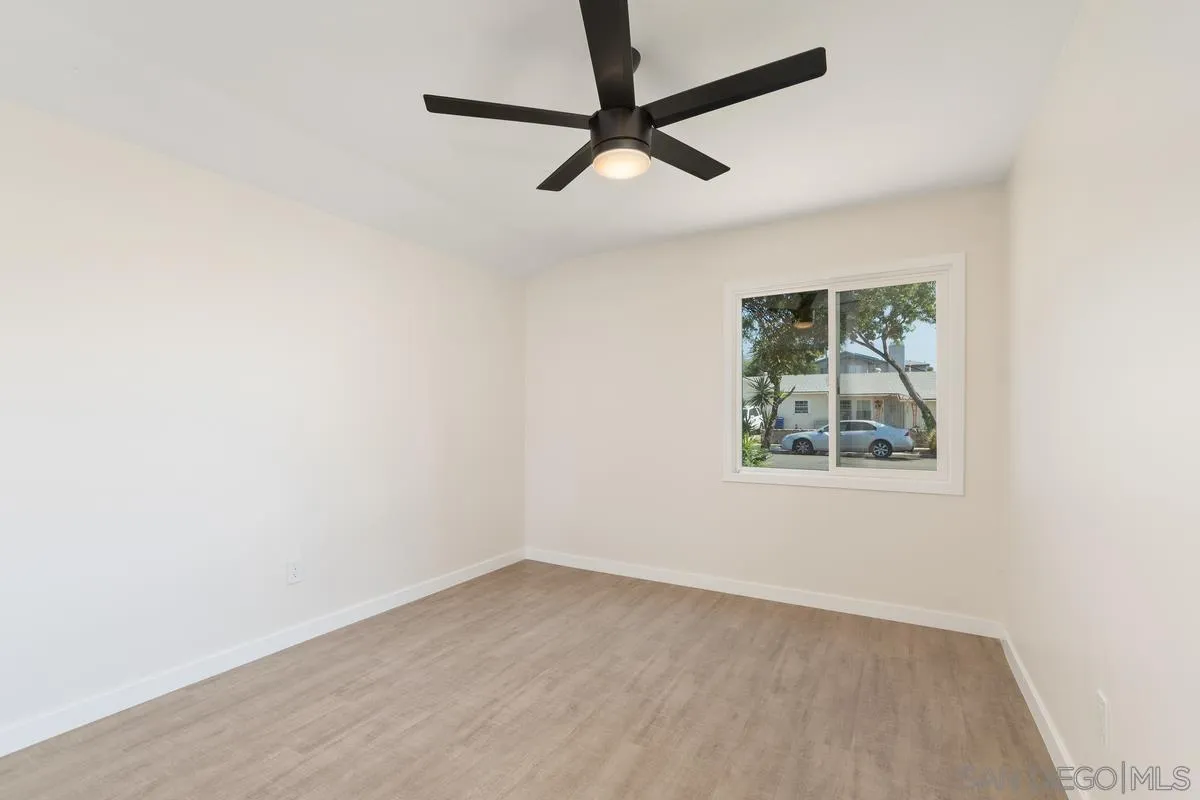 9257 Ruffin Road Santee, CA 92071 - Photo 15 of 28 an empty room with a window