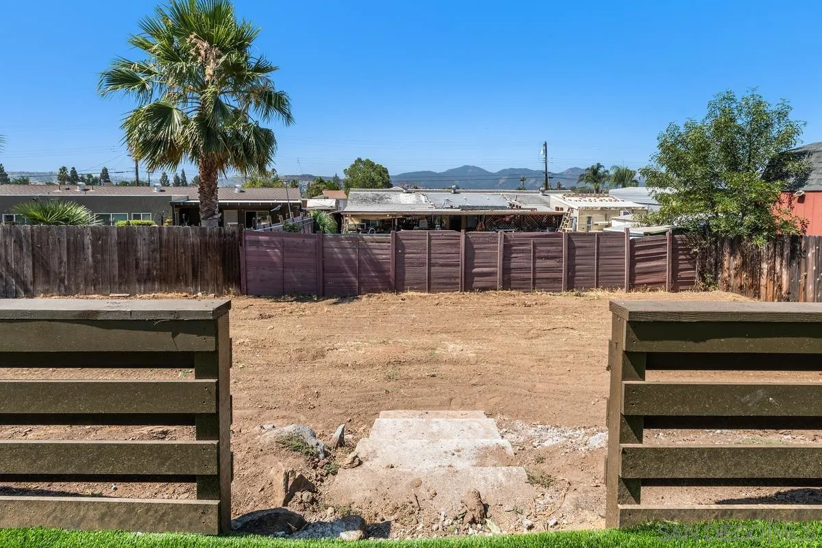 9257 Ruffin Road Santee, CA 92071 - Photo 20 of 28 a view of a swimming pool with a chair