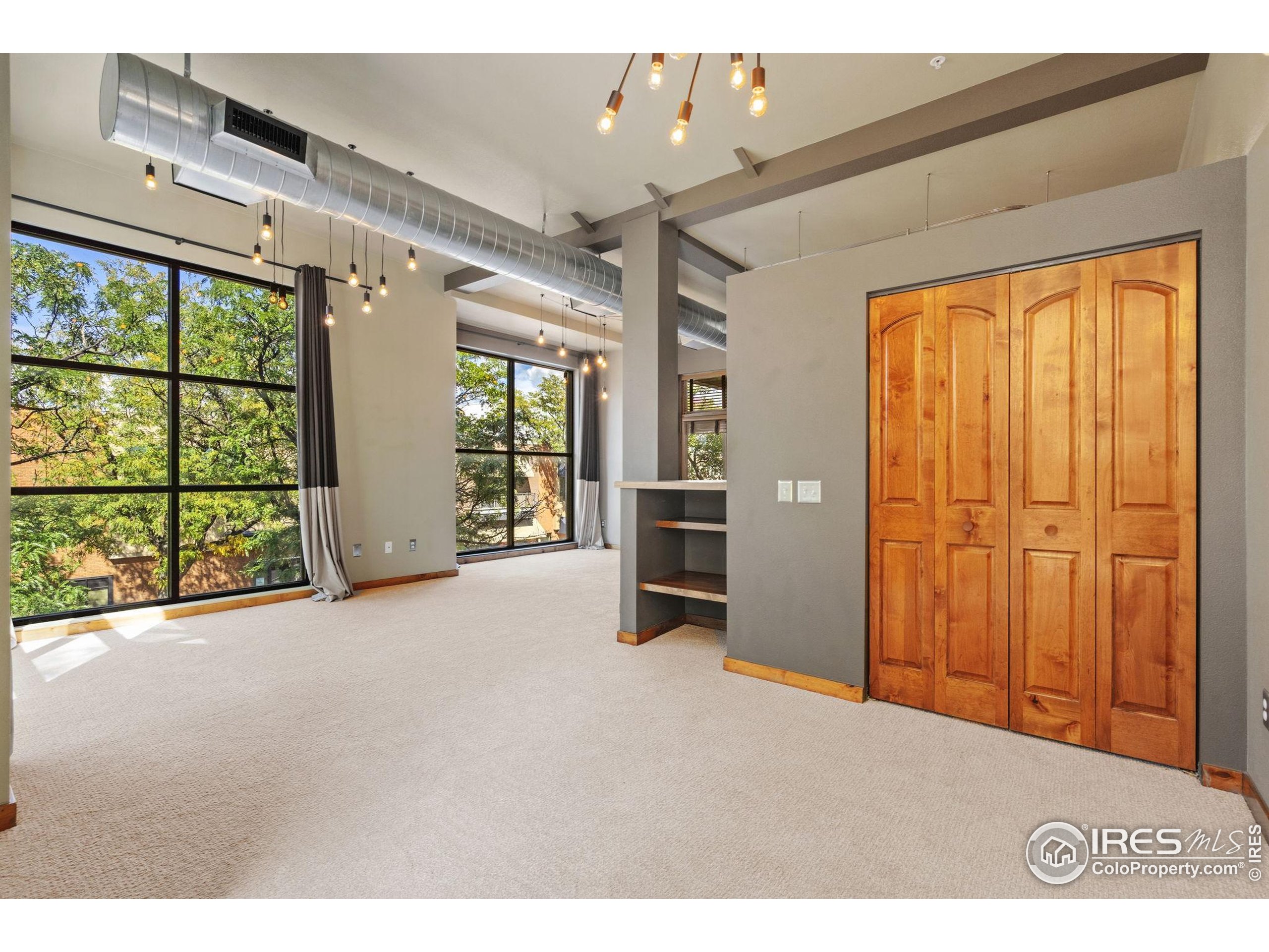 200 South College Avenue, Unit 201 Fort Collins, CO 80524 - Photo 11 of 19 a view of an empty room with a window