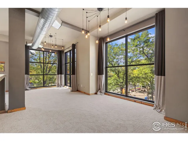 a view of an entryway with a floor to ceiling window