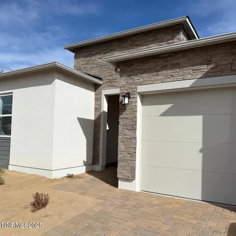 a view of backyard with cabin