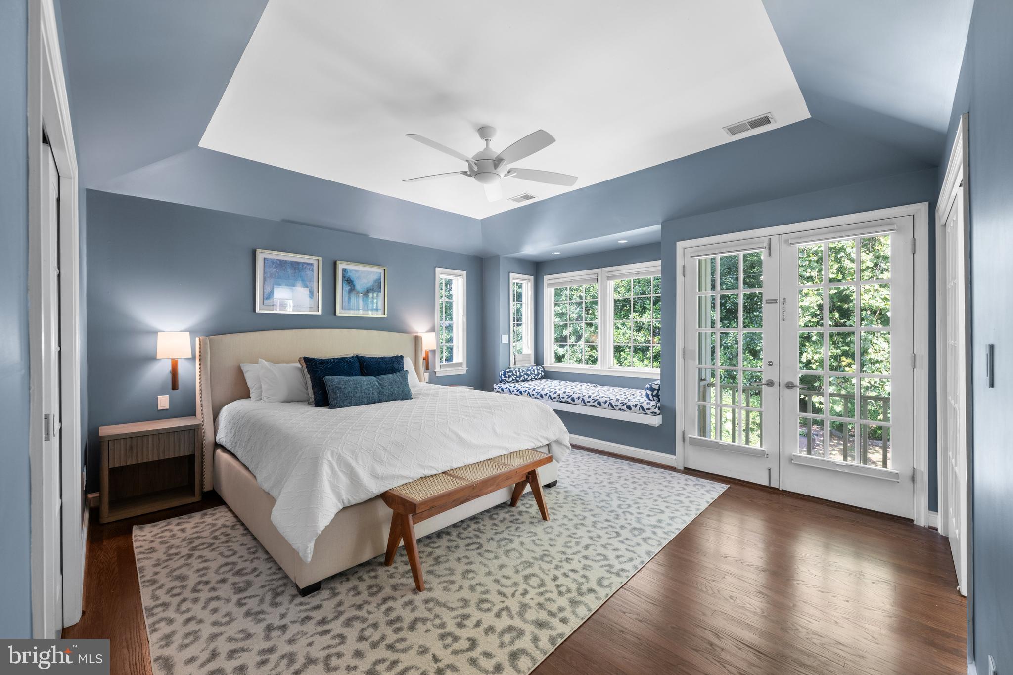 3915 47th Street Northwest Washington, DC 20016 - Photo 11 of 40 a spacious bedroom with a large bed and a large window