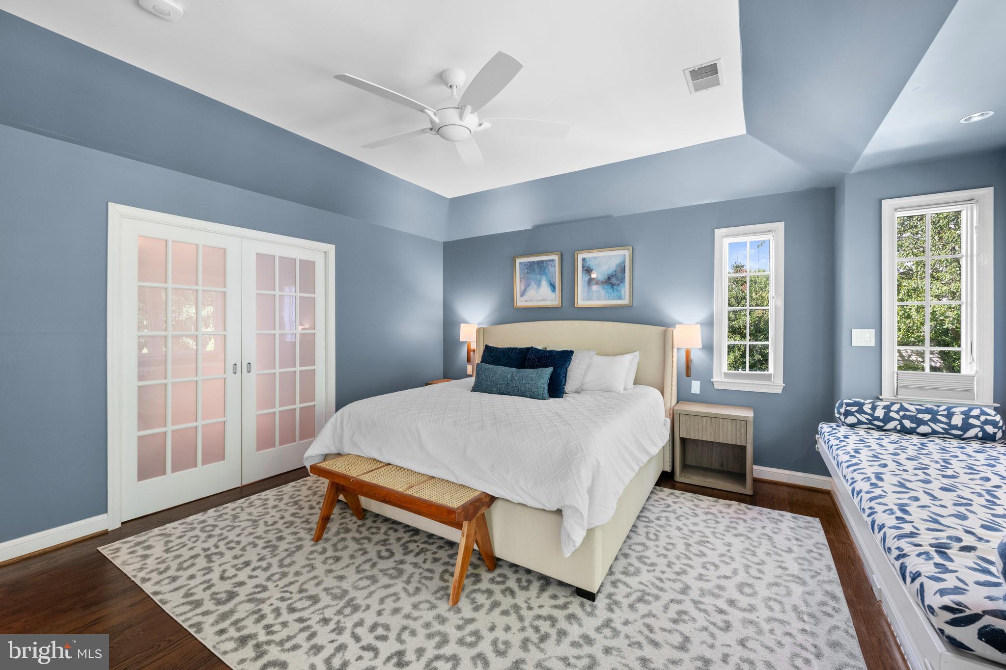 3915 47th Street Northwest Washington, DC 20016 - Photo 15 of 40 a bedroom with a bed and wooden floor