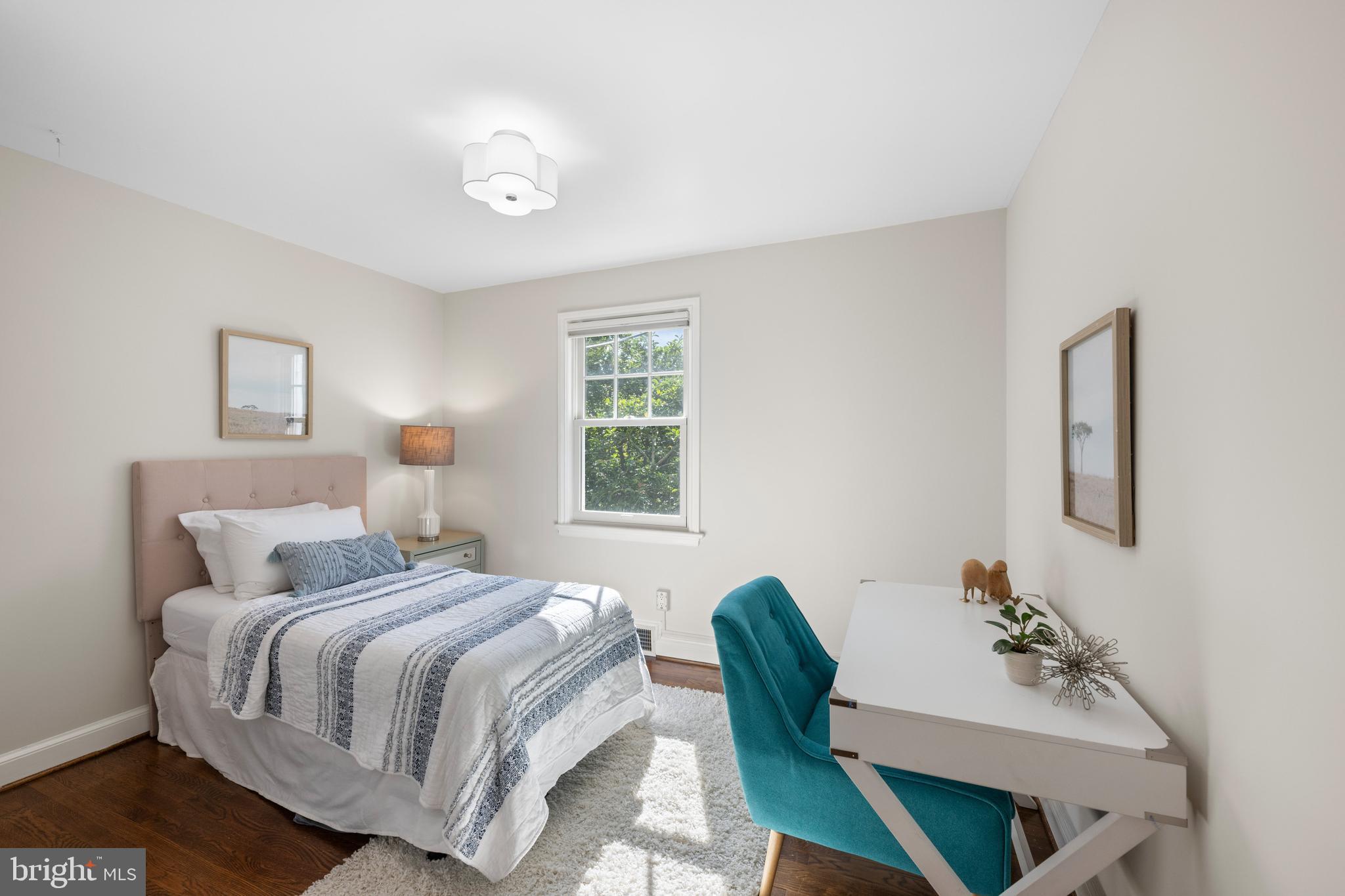 3915 47th Street Northwest Washington, DC 20016 - Photo 21 of 40 a bedroom with a bed and window