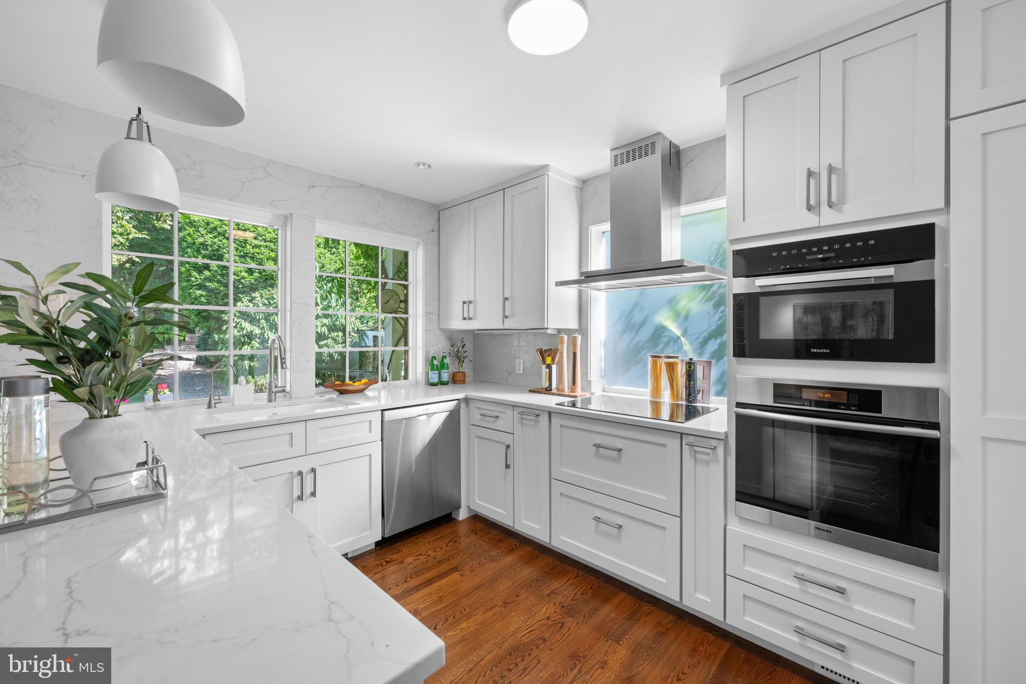 3915 47th Street Northwest Washington, DC 20016 - Photo 8 of 40 a kitchen with a sink stove and microwave