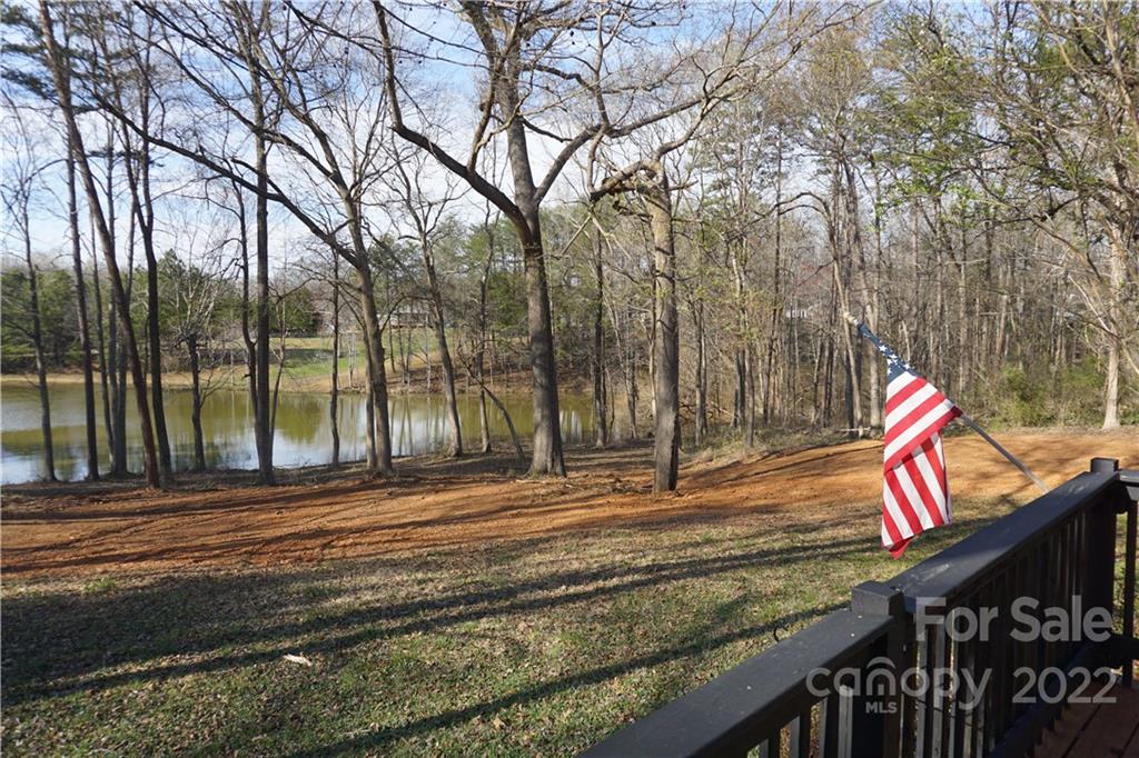 1291 Hines Road Clover, SC 29710 - Photo 24 of 26 a view of a park with couches and wooden fence