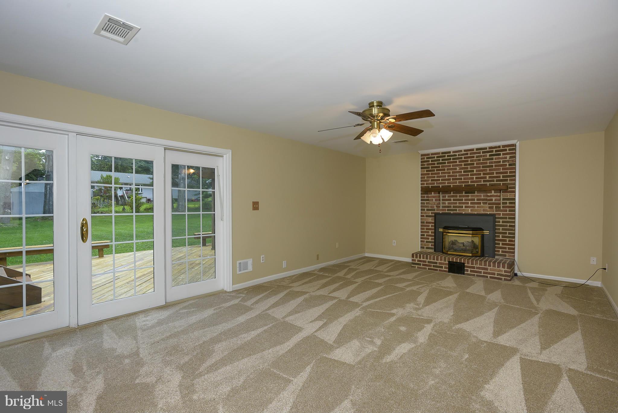 6089 Loventree Road Columbia, MD 21044 - Photo 11 of 30 Family Room with gas insert fireplace