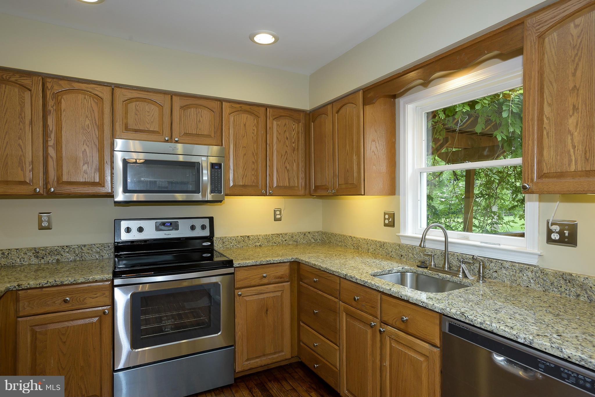 6089 Loventree Road Columbia, MD 21044 - Photo 9 of 30 Kitchen with granite counters