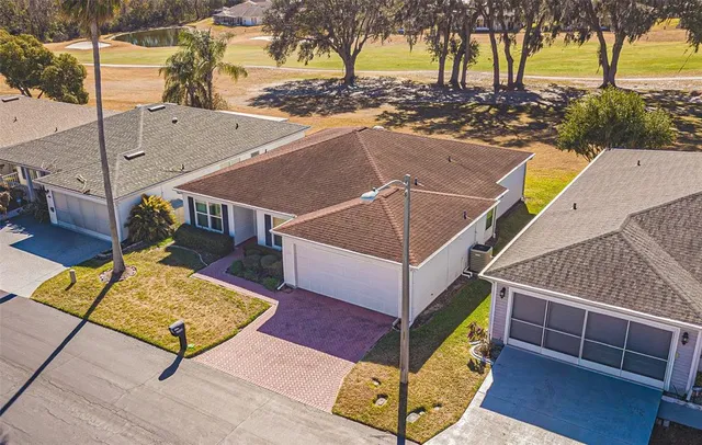 a view of a backyard with a patio
