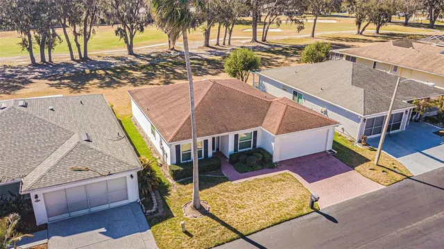 swimming pool view with a outdoor seating