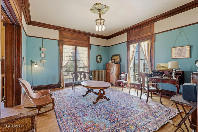 a kitchen with stainless steel appliances granite countertop a refrigerator and wooden cabinets