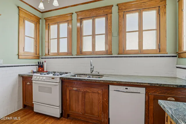 a bathroom with a shower and a mirror
