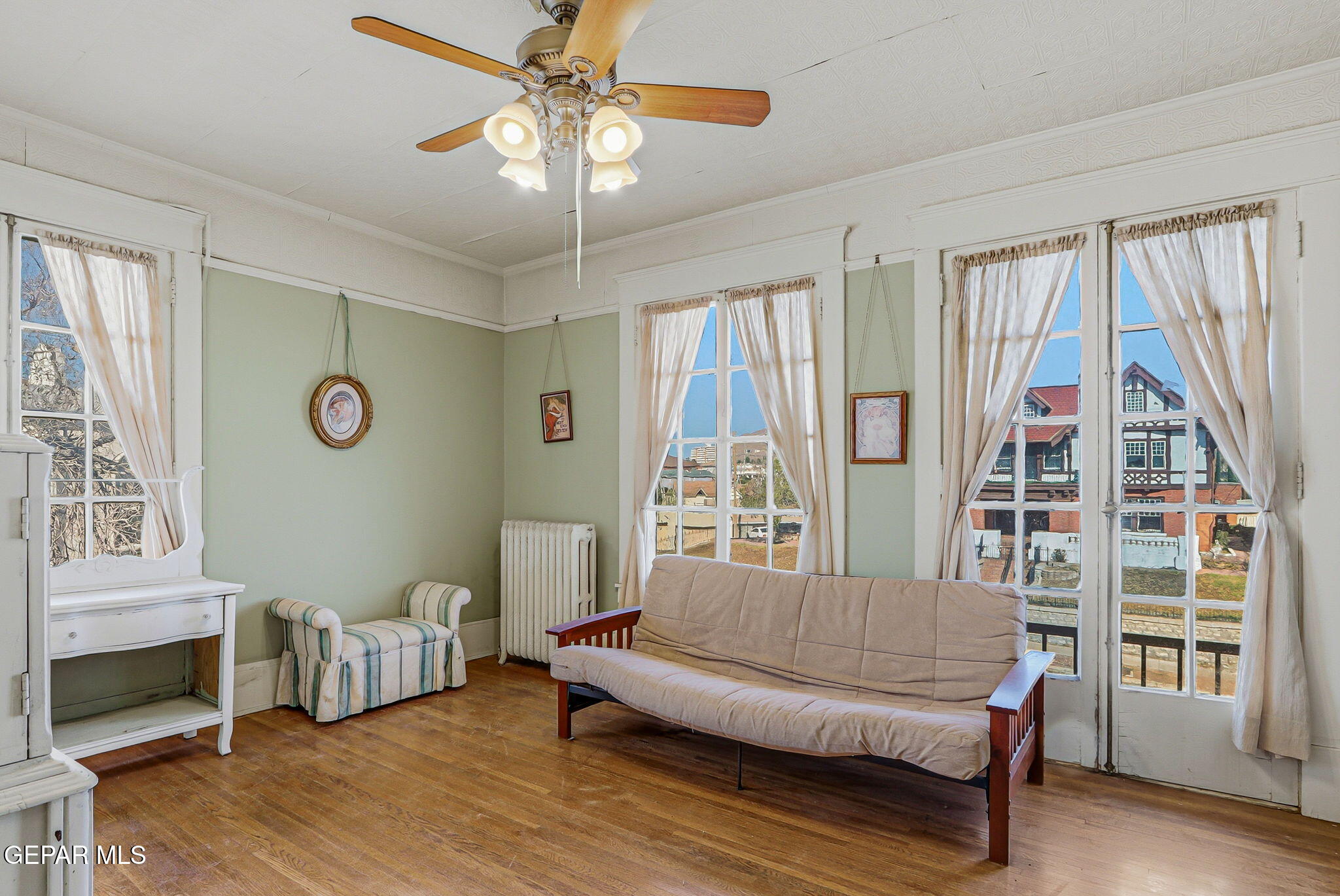 525 Corto Way El Paso, TX 79902 - Photo 39 of 98 a living room with furniture and a window